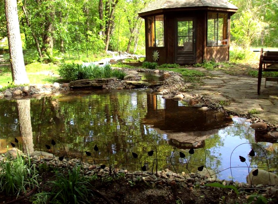 Backyard pond, waterfall and flagstone patio built by JC Landscaping in Eagan, MN